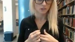 Cute nerdy auburn girl in black blouse was ready to masturbate in library