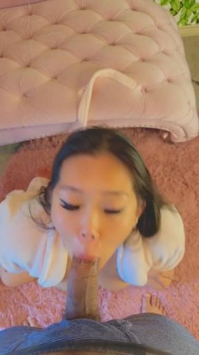 Asian babe sucks balls and cock, swallows surprise facial