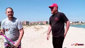 Two guys pick up a kinky babe on the beach and demolish all her holes