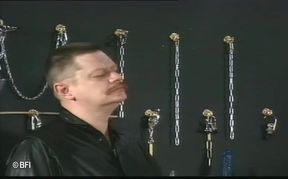 Leather wearing sub gets dominated by her masked master