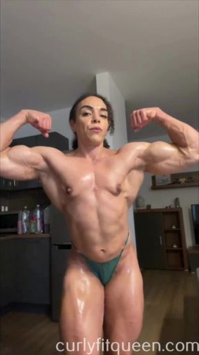 Naked muscle mommy showing off her flexed muscles