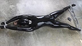 Rubber-bound Girl In Electro Play :: Latex BDSM Slave Spread Eagle Scene