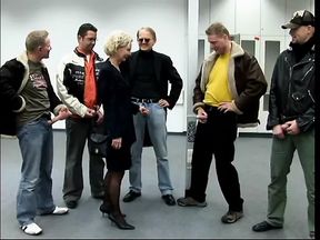 Mature blonde in stockings is penetrated in all holes