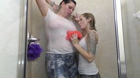 Busty lesbians make a mess with wet pussies