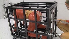 Toolthe Steel Cage :: Latex Femdom Pegging with Gas Mask