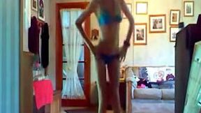 Tall blonde babe with skinny legs is dancing on webcam