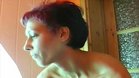 Horny German chick masturbating in the backyard